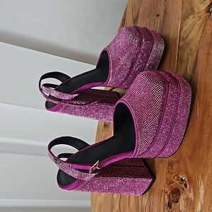 Pink bejeweled platform heels